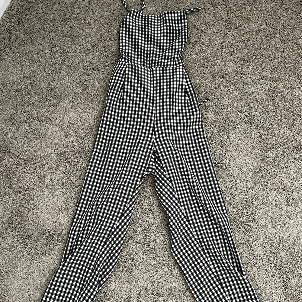 Black and white checkered jumpsuit from Showpo size US 10